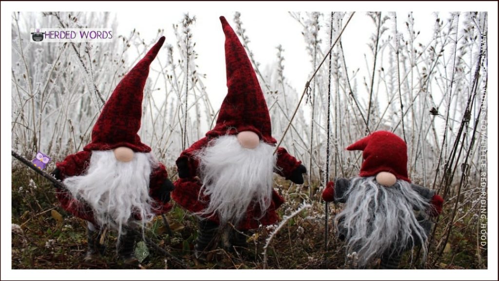 three gnomes wearing red hats and outfits