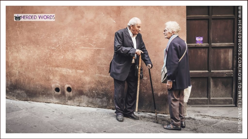 An elderly man and woman talking to each other