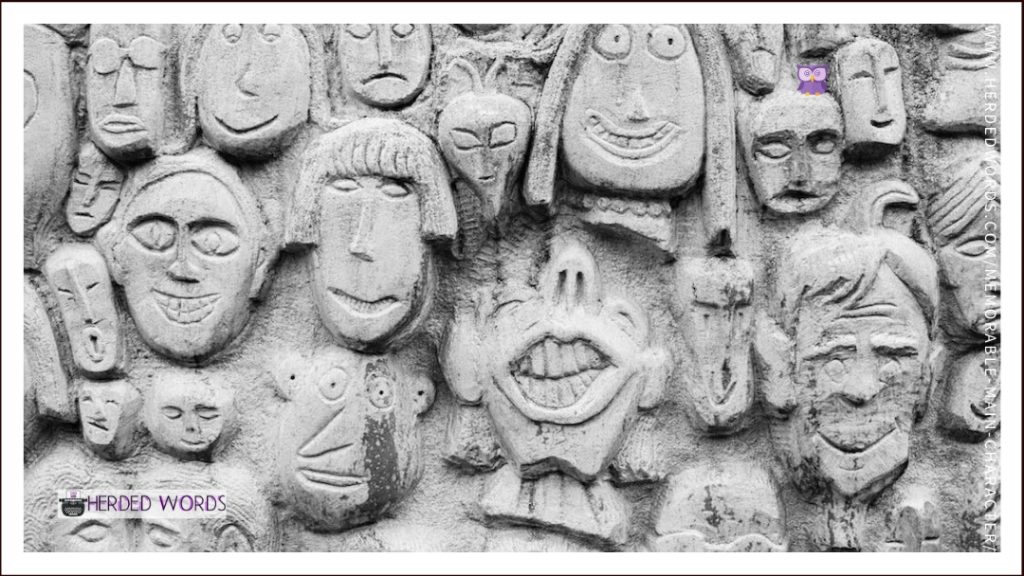 a wall with faces carved into it