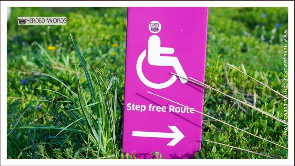 a sign showing where to go for a step free route