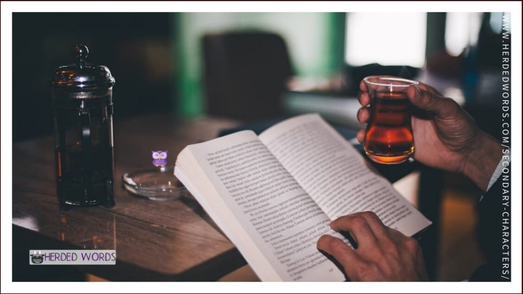 a person drinking tea and reading a book