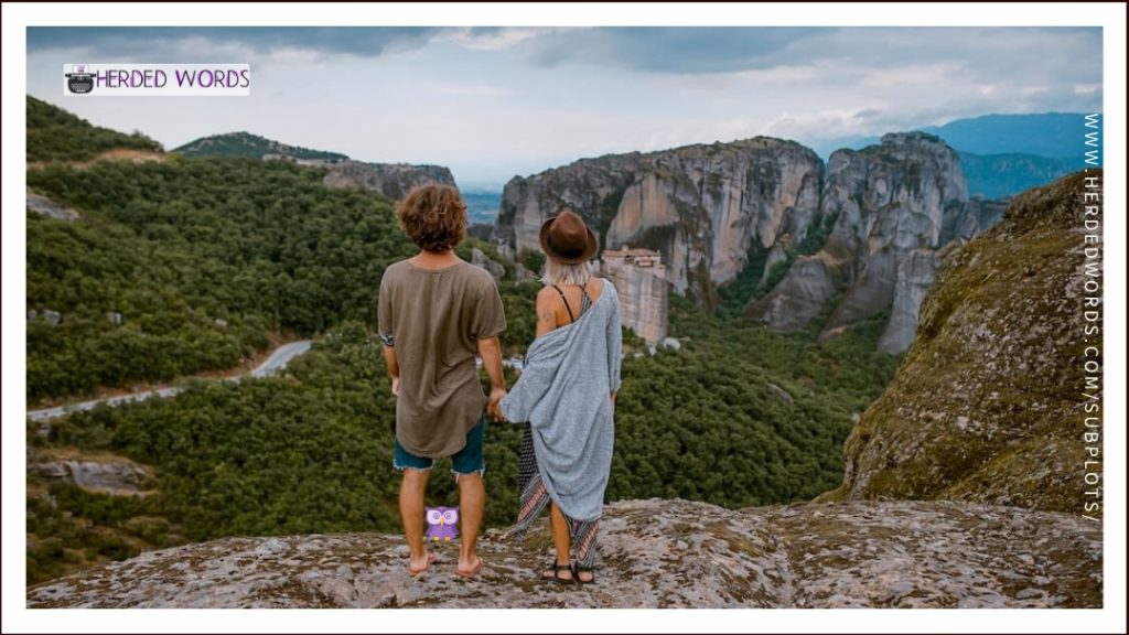 A couple standing at a viewpoint